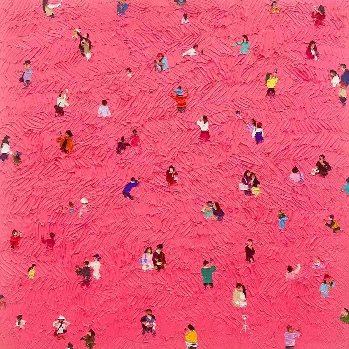 Tiny people scattered across a vivid pink field
