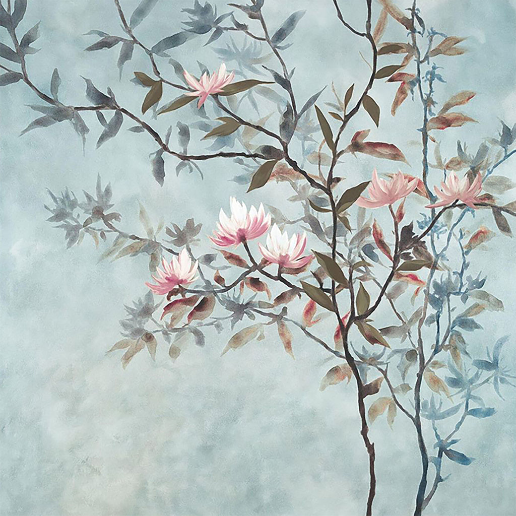 A magnolia branch with pink blooms on soft blue