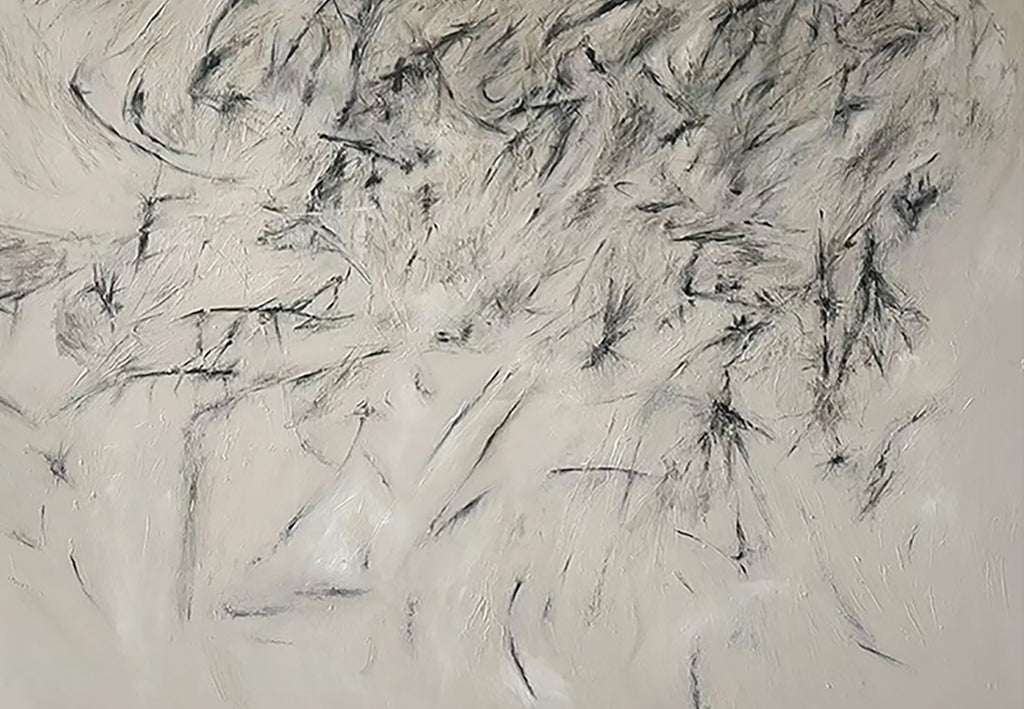 Quick black ink strokes scattered over pale grey