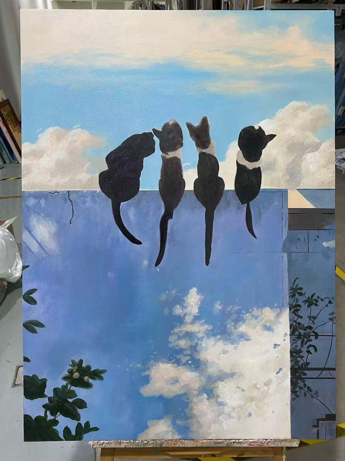 Three Cats on a Blue Wall