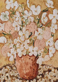 White blossoms spilling from a terracotta pot on ochre