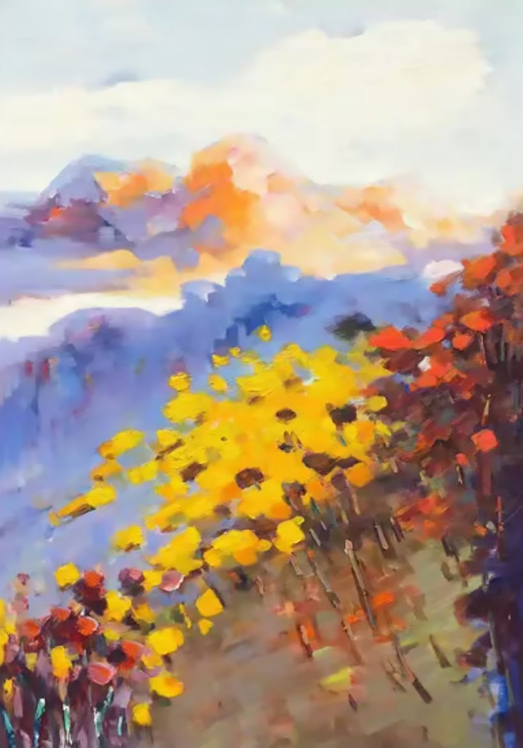 Yellow and red blooms on a hillside under violet mountains