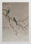 Two dark birds on a blossoming plum branch on grey