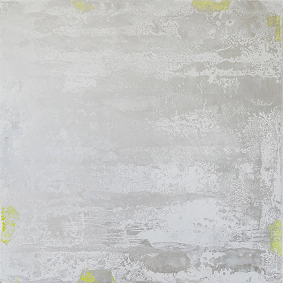 A cloudy silver-grey surface with faint pale marks