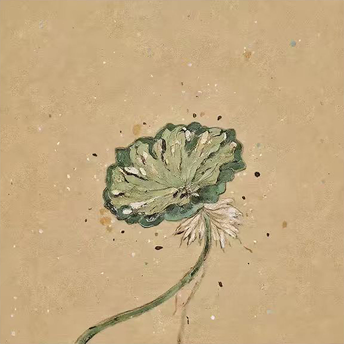 A single green lotus leaf on a speckled kraft-brown ground