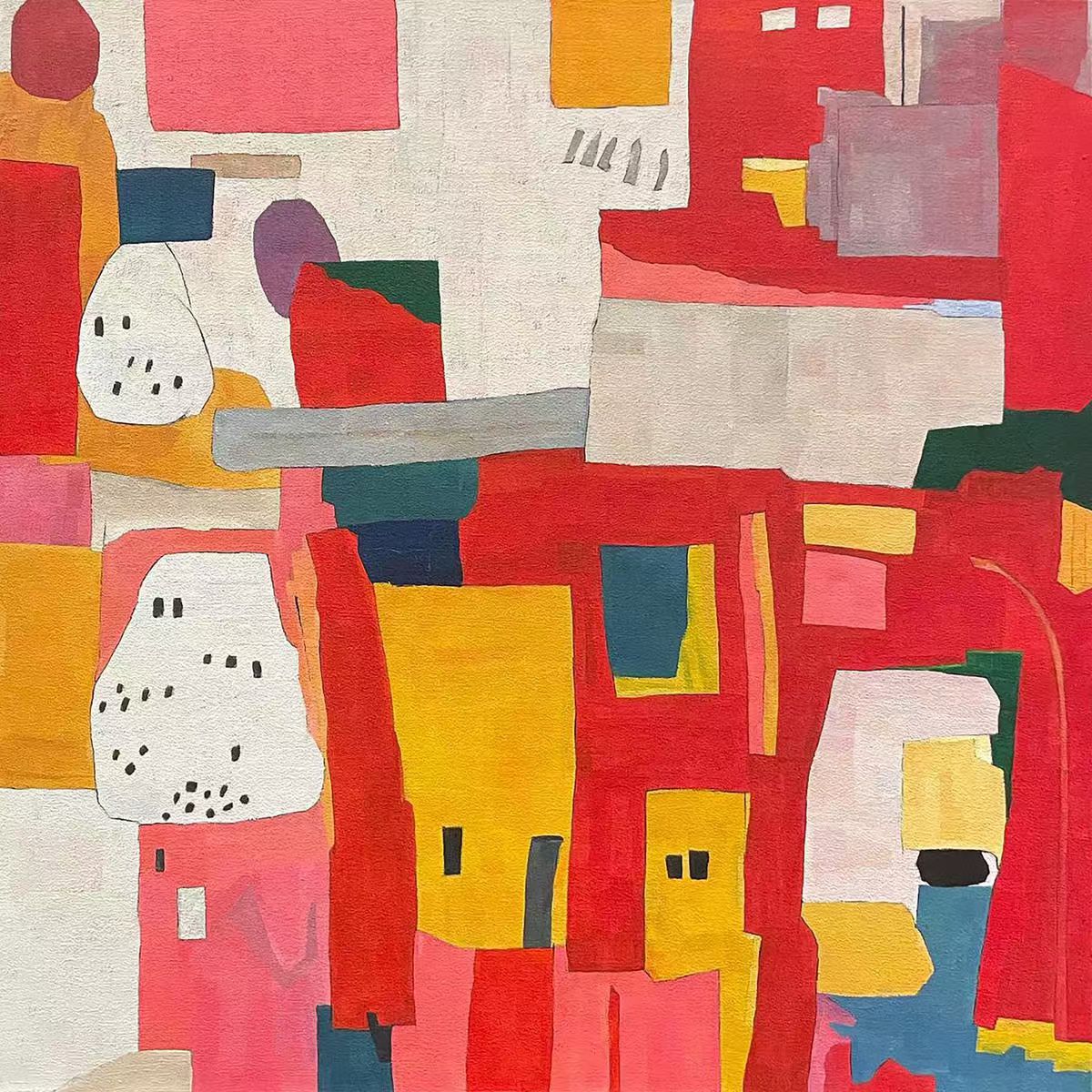 Patchwork blocks of red, yellow and cream like a town wall