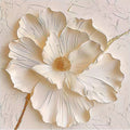 A huge ivory flower sculpted with a gold centre