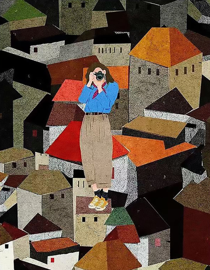 A woman with a camera standing above a patchwork of red rooftops
