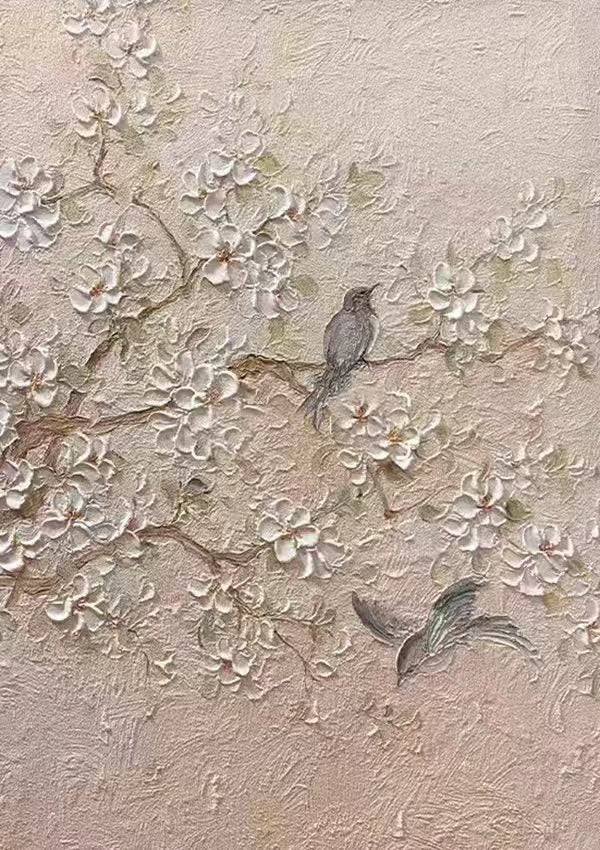 Small grey birds among a cloud of raised white blossoms