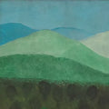 Layered green and teal hills rolling toward a dark tree line