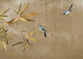 Two blue birds among gold bamboo leaves on taupe