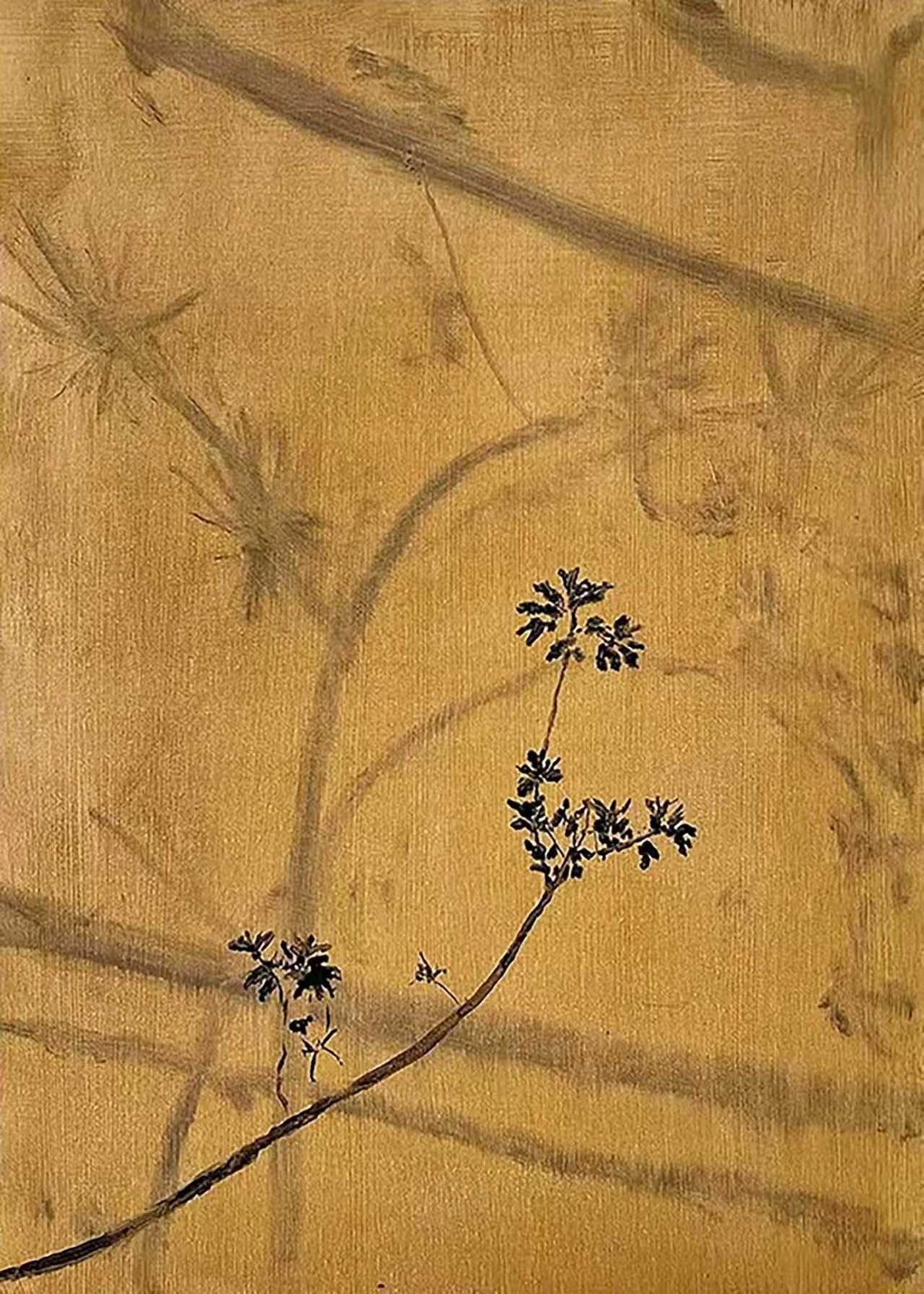 A dark ink sprig over faded gold leaves