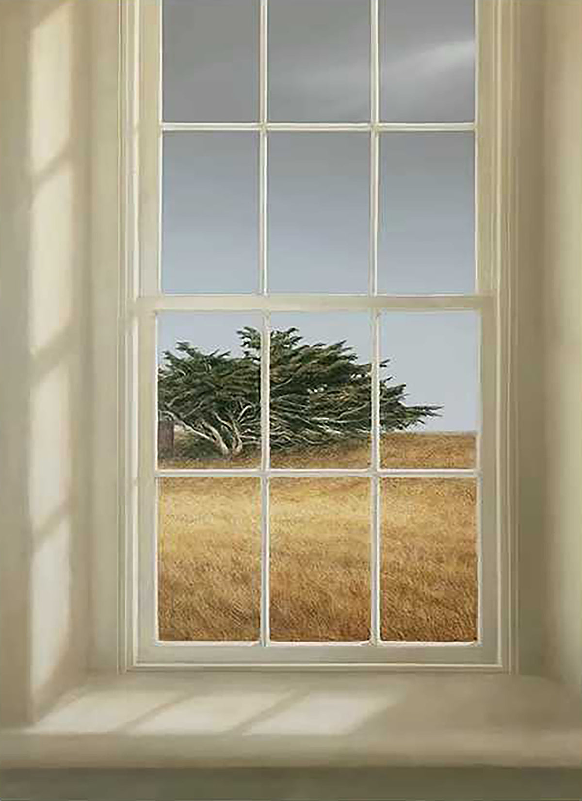 A tall window opening onto a golden field and dark tree