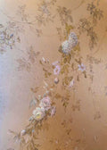 Faint wisteria and roses trailing on bronze