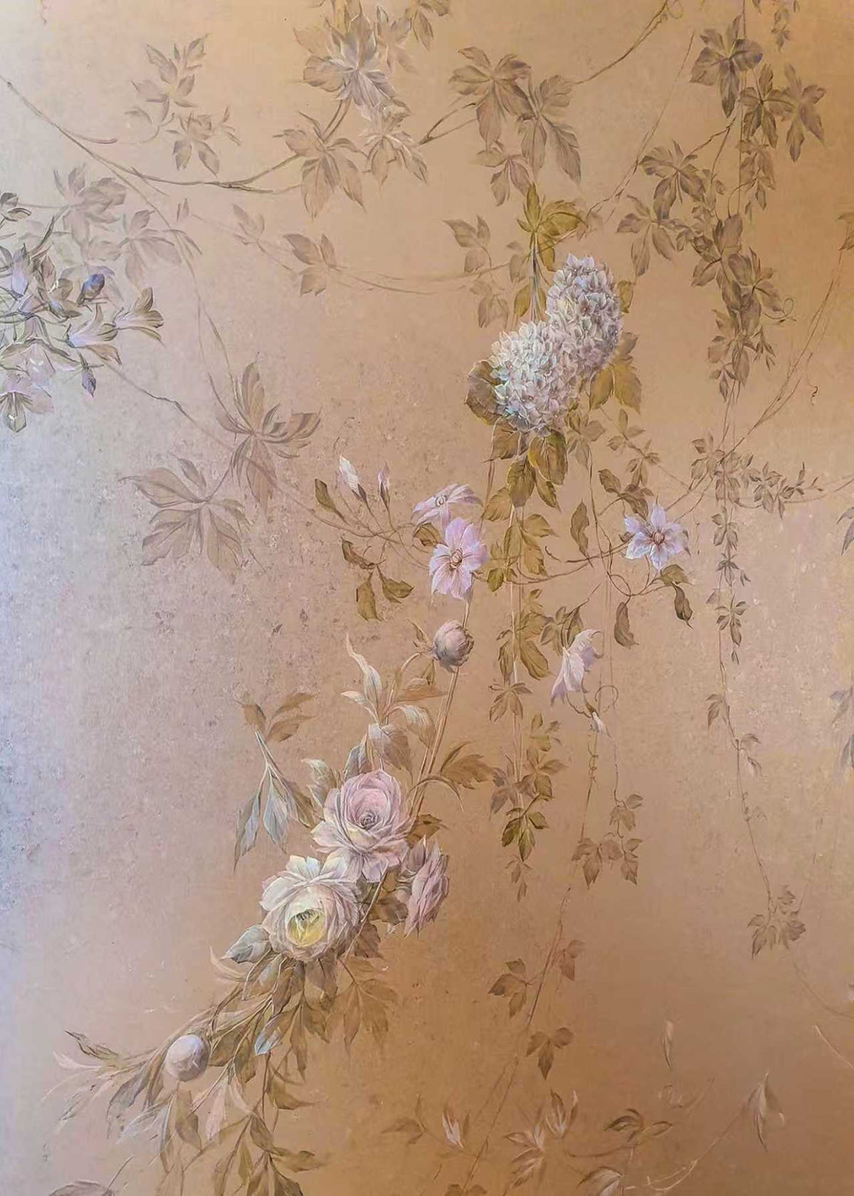Faint wisteria and roses trailing on bronze