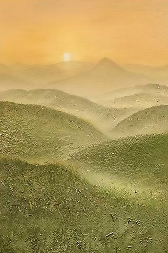 A soft sunrise above layered misty green hills