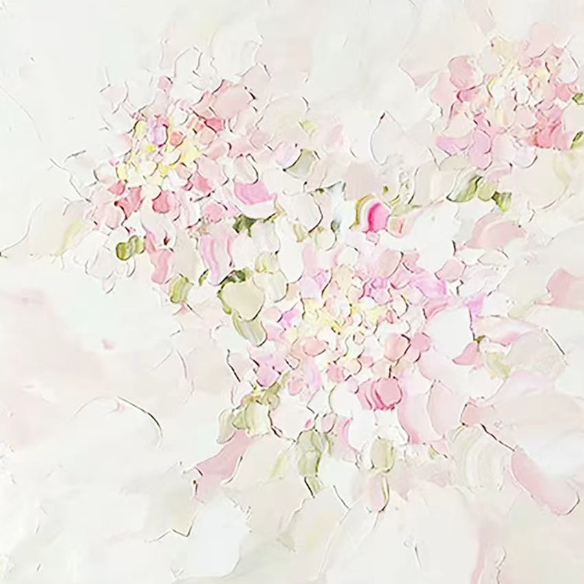 Delicate blush and cream petals sculpted on white