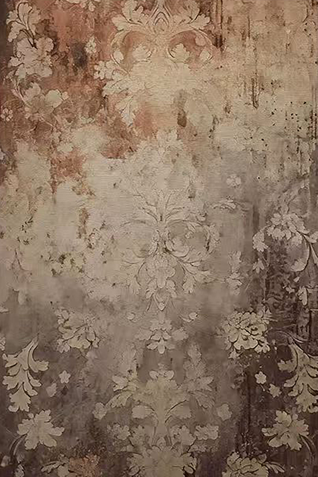 A worn wall of faded floral damask in rust and grey