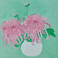 Spiky pink chrysanthemums in a round white pot on mint