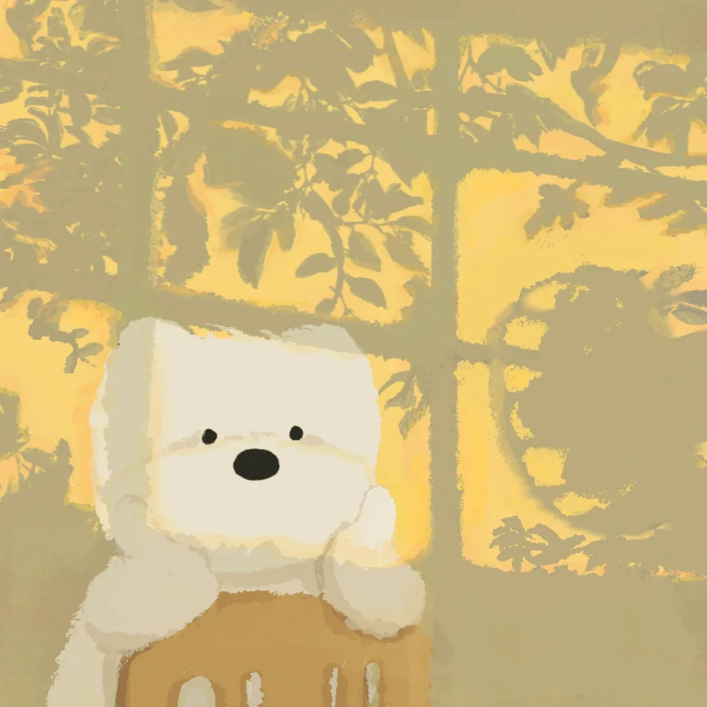 A fluffy white bear toy in yellow light with leaf shadows