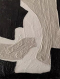 Thick ivory arcs carved over black