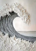 A curling wave sculpted in white and grey paint