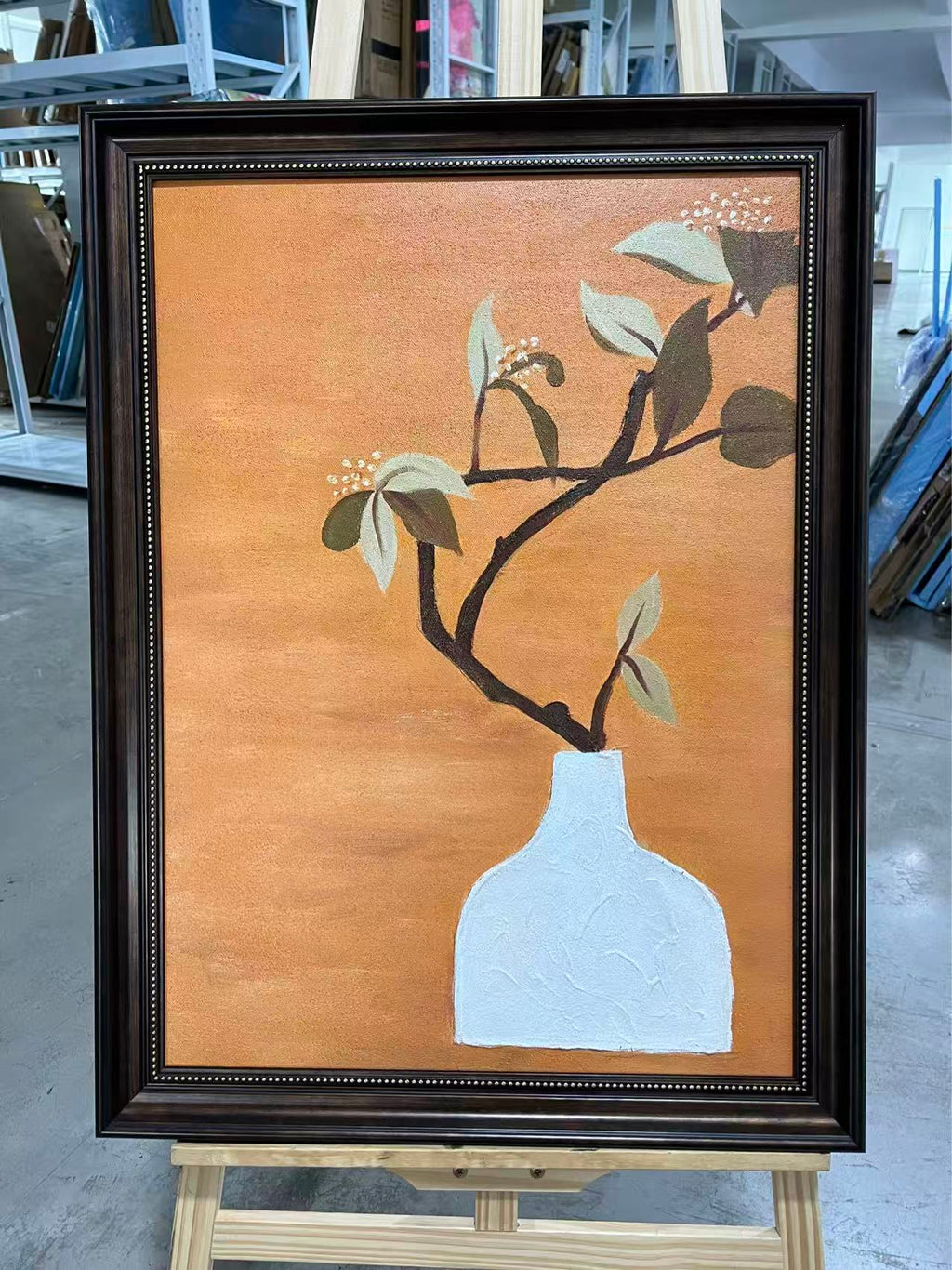 Branch in a White Vase