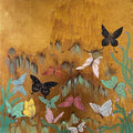 Colourful butterflies drifting over misty gold and teal hills