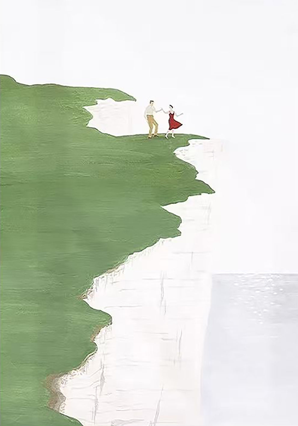 A tiny couple standing on a green clifftop above a white sea