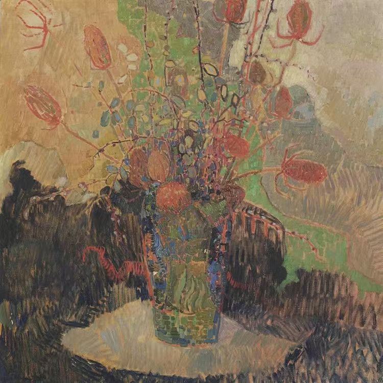 An earthy bouquet of dried flowers in muted gold and rust