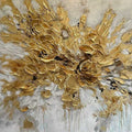 An explosion of gold and white paint with drips