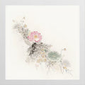 A pink lotus with leaves and grasses drifting across white
