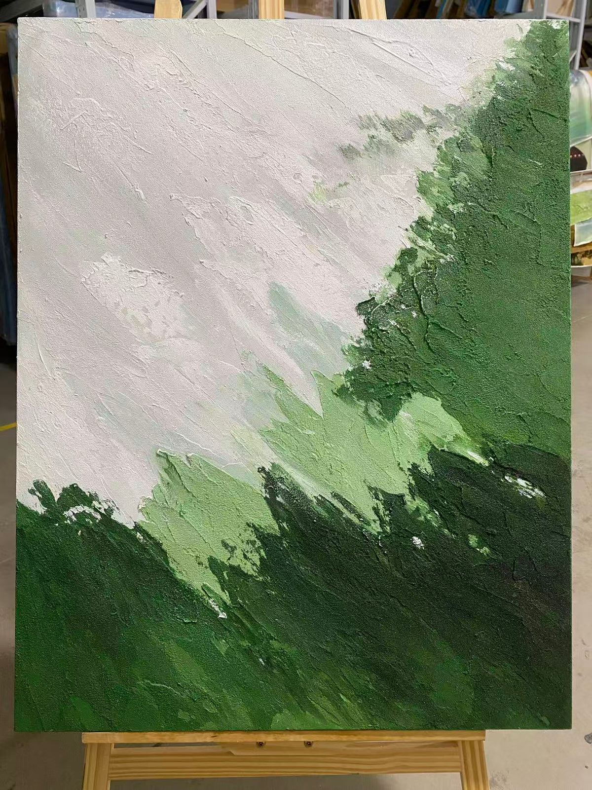 Green Slope and White Sky
