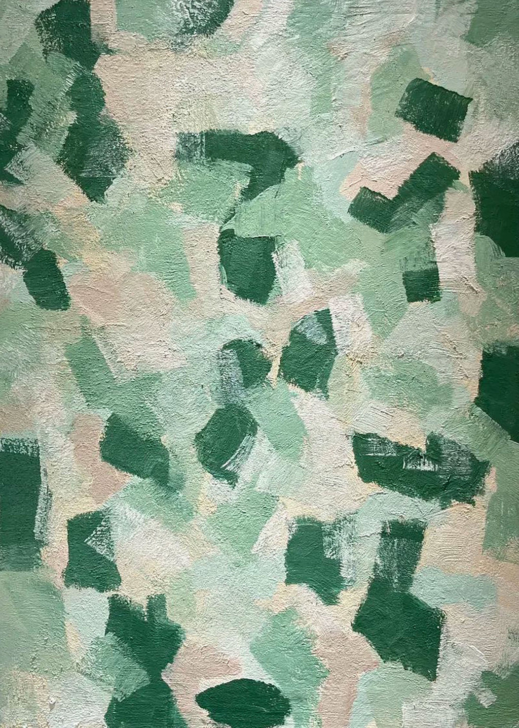 Patches of emerald and mint laid like camouflage