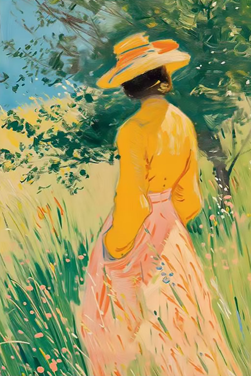 A woman in a yellow blouse and straw hat among tall summer grasses