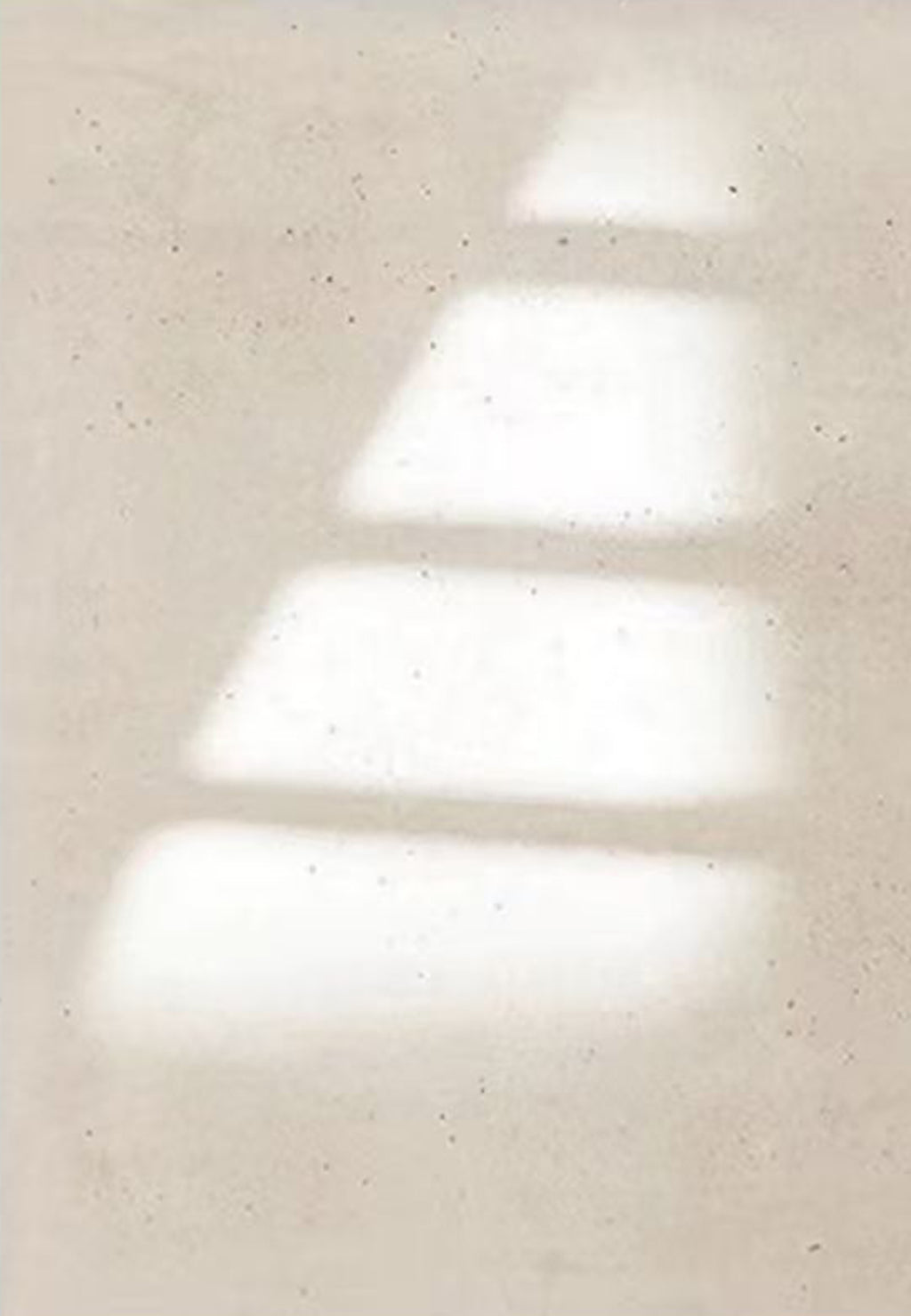 Steps of soft window light on a linen-beige wall
