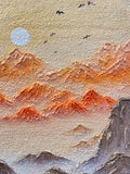 Sculpted orange ridges with birds and a pale moon
