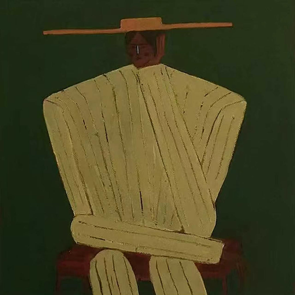 A seated figure in a ribbed cream coat and wide hat on deep green