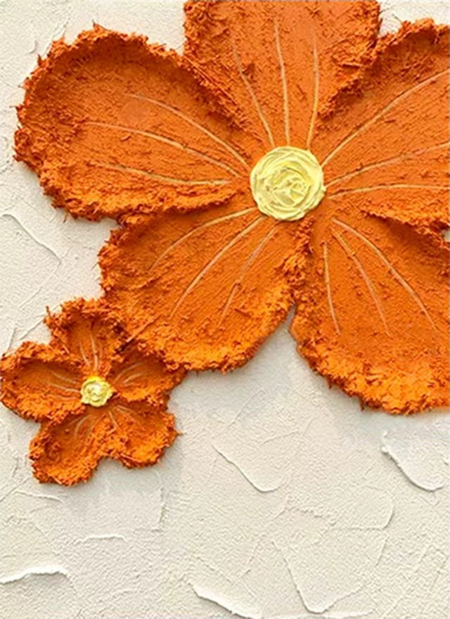 Two big orange flowers sculpted in rough textured paint on cream