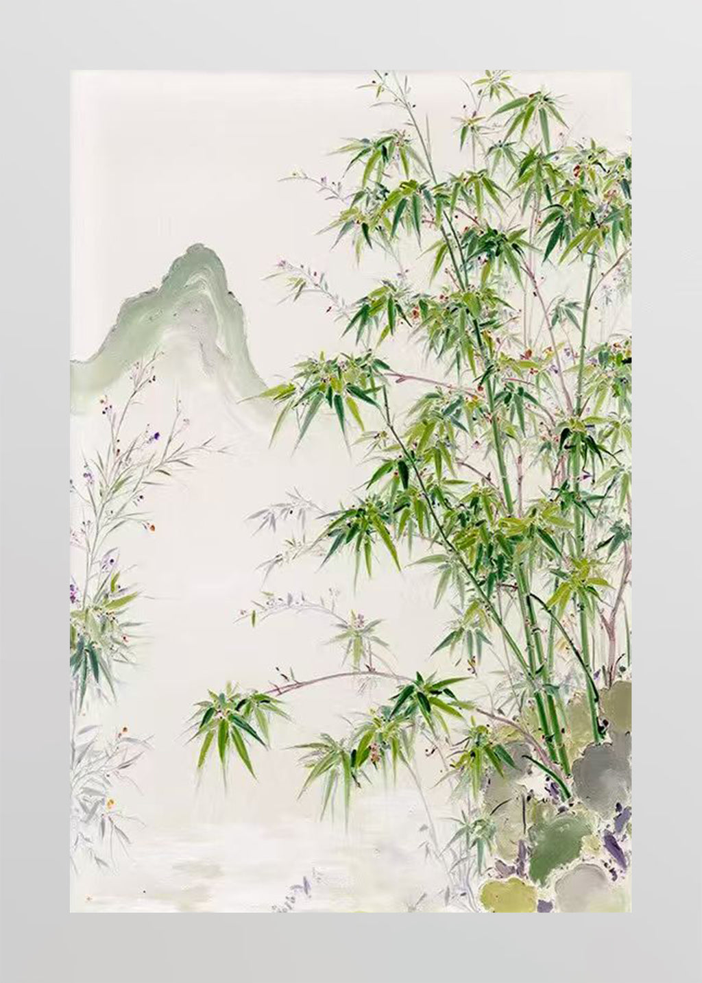 Green bamboo before soft misty hills on cream