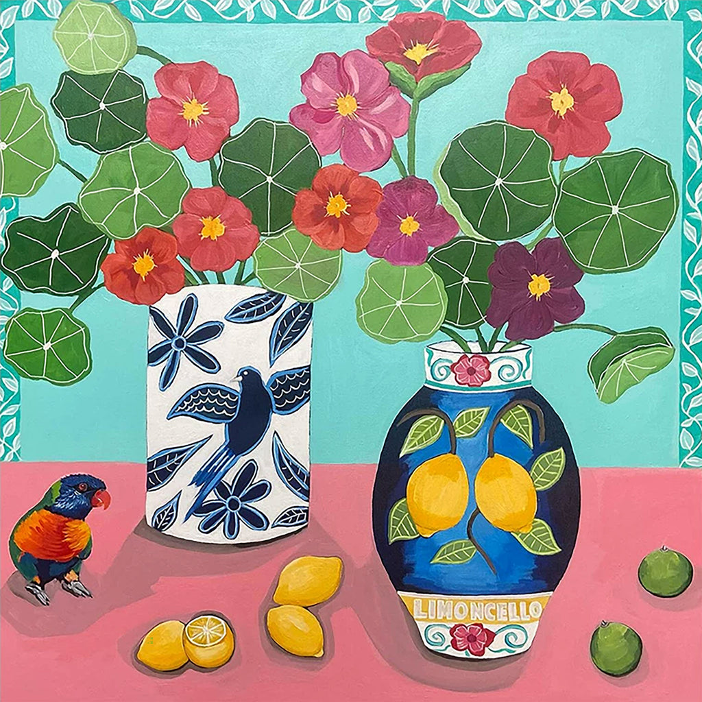 Red nasturtiums in patterned vases with lemons and a bright lorikeet