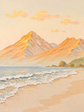 Peach-lit mountains above a soft beach with lapping waves
