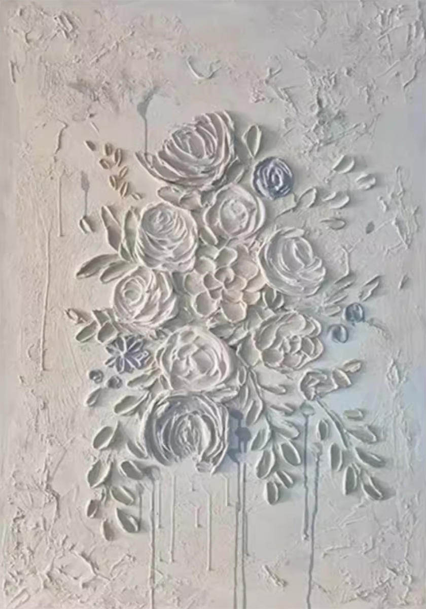 A cluster of roses sculpted in white relief on pale grey