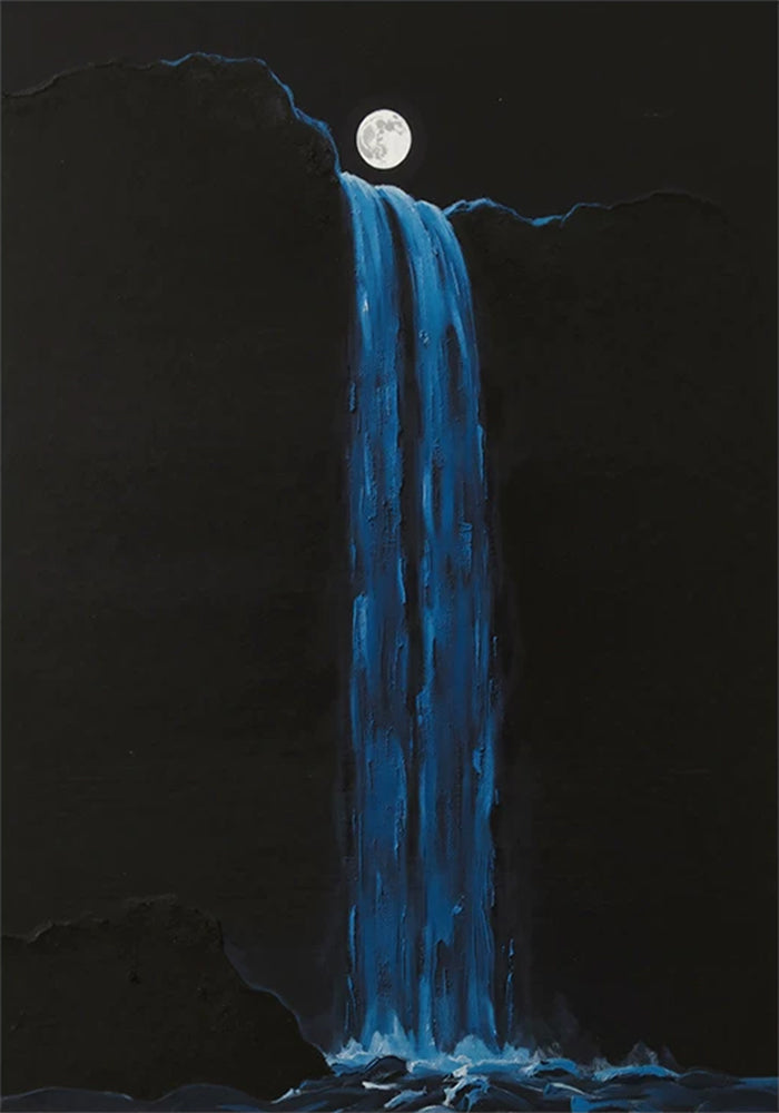 A blue waterfall pouring from black cliffs beneath a full moon
