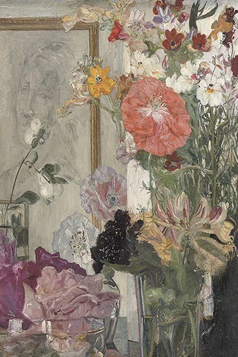 A loose bouquet of coral, lilac and white flowers before a mirror in soft, faded light