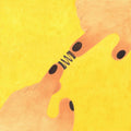 Two tan fingers touching on a bright yellow ground, joined by a small spring