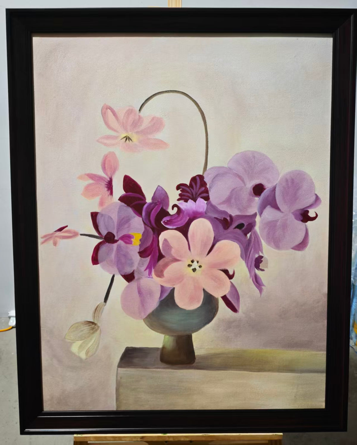 Orchids in a Green Pot