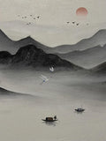 Misty ink mountains, cranes and small boats beneath a red sun