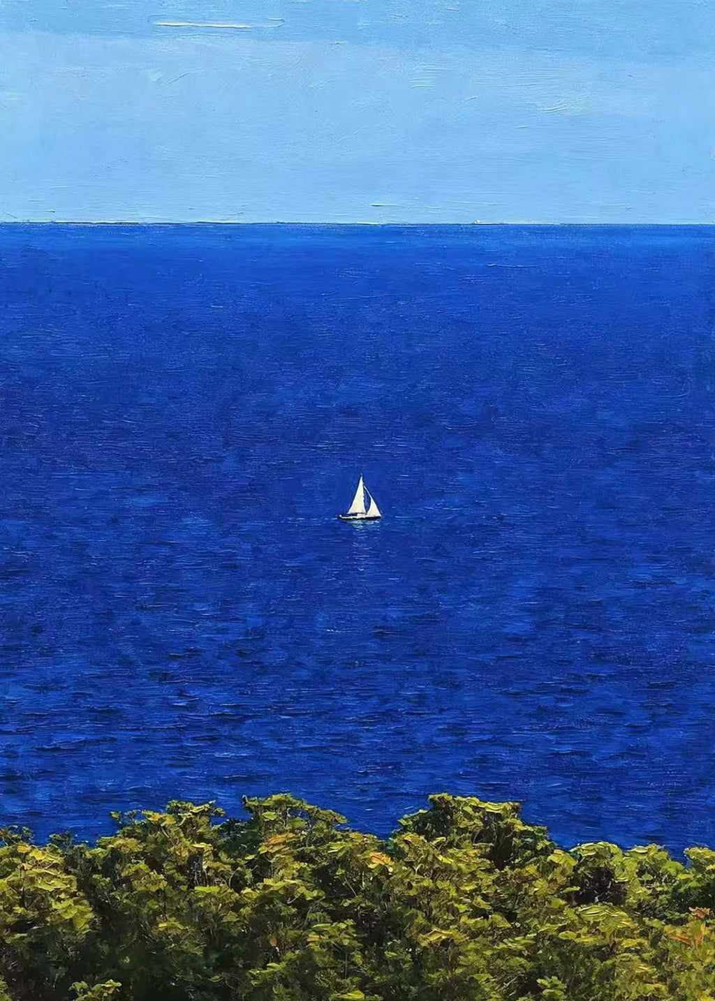 A single white sail on a vast cobalt sea above green treetops
