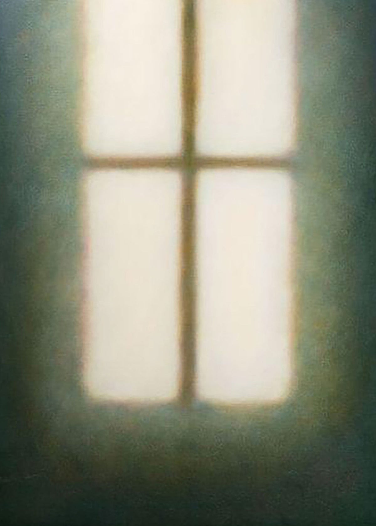 A soft-glowing window floating in deep green shadow